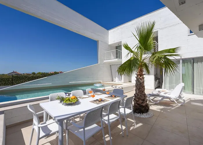 Dante Zadarvillas Vila *